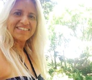 Ivette Pinela, a woman with long blonde hair, is captured smiling in front of a tree in her profile picture.