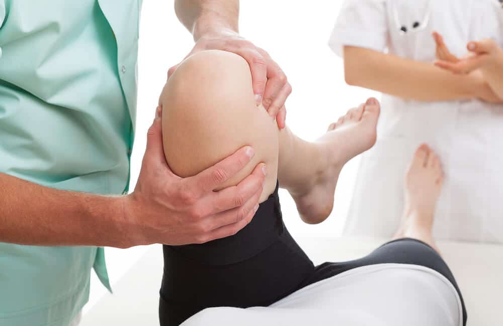 A patient is being examined by a doctor.