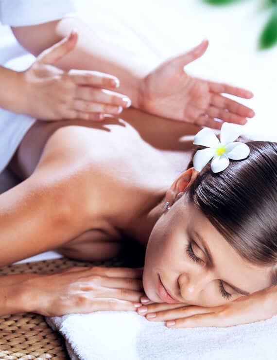 A woman getting a back massage.